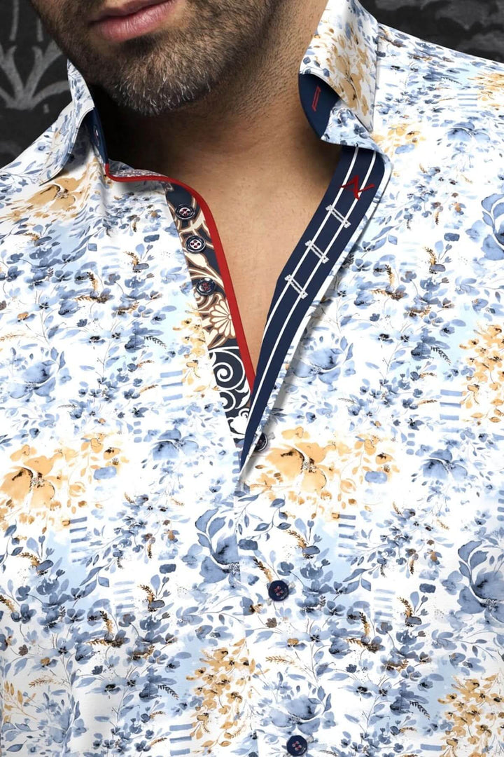 Chemise Pryse à imprimé floral en teintes douces avec col géométrique contrastant et détails raffinés.