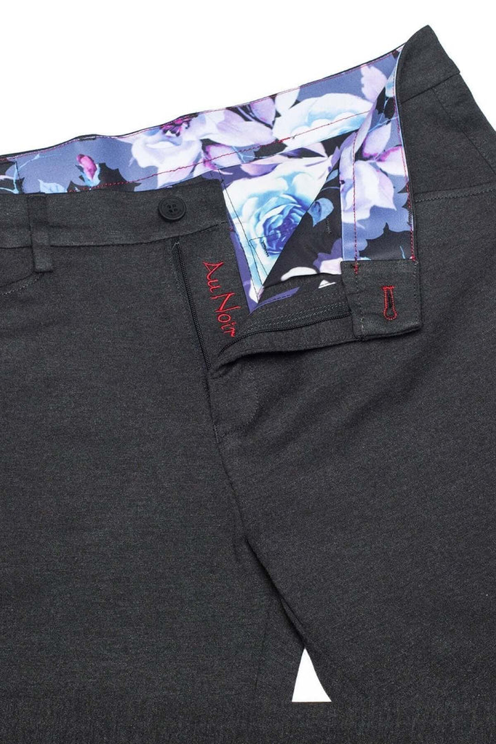 Pantalon de style Magnum avec doublure florale, coupe ajustée et tissu extensible pour un confort optimal.