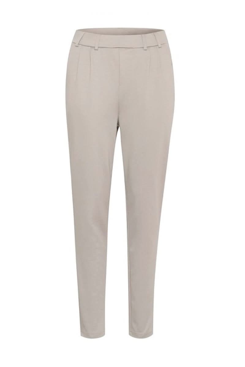 Pantalon habillé Jenny beige à coupe fuselée, taille élastique, élégant et confortable, parfait pour un style décontracté.