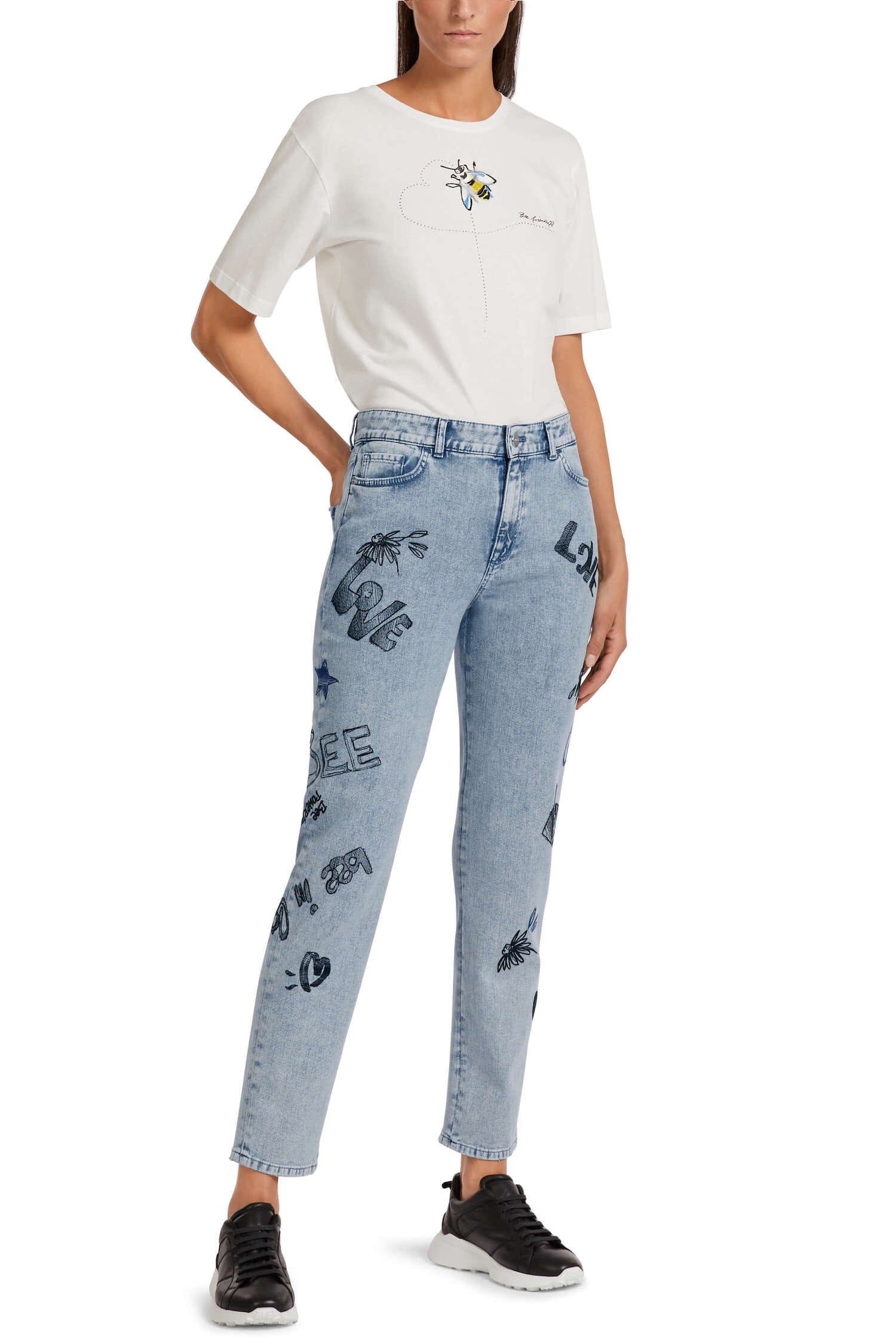 Embroidered jeans with writing