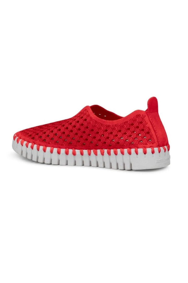Mocassin Tulip139 rouge à tige ajourée, semelle blanche, confort optimal et design élégant.