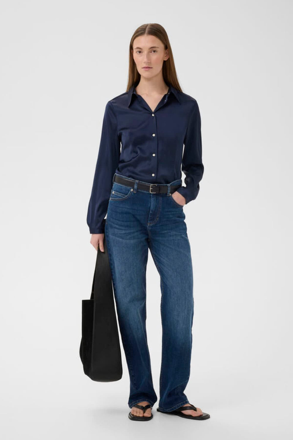 Front view of a blue women's blouse with a Inwear collar and buttons - Valérie Simon