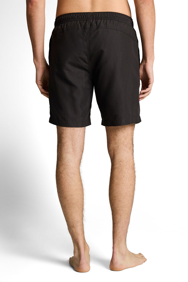 Solid-color swimsuit with an elastic waistband