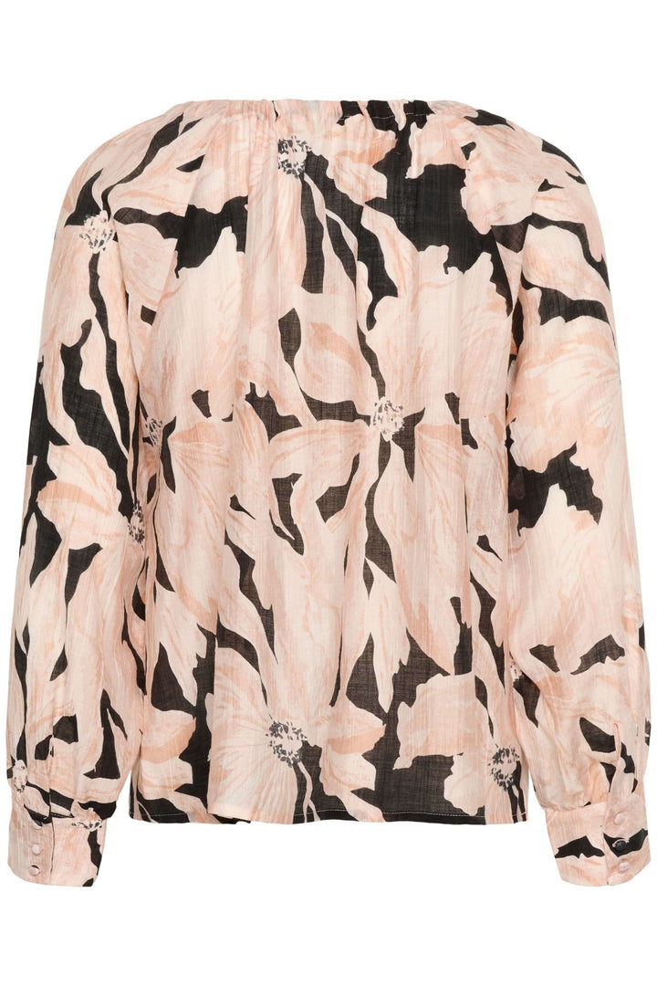 Blouse Reese avec imprimé artistique, col rond froncé avec nœud, manches longues bouffantes pour un style chic et moderne.