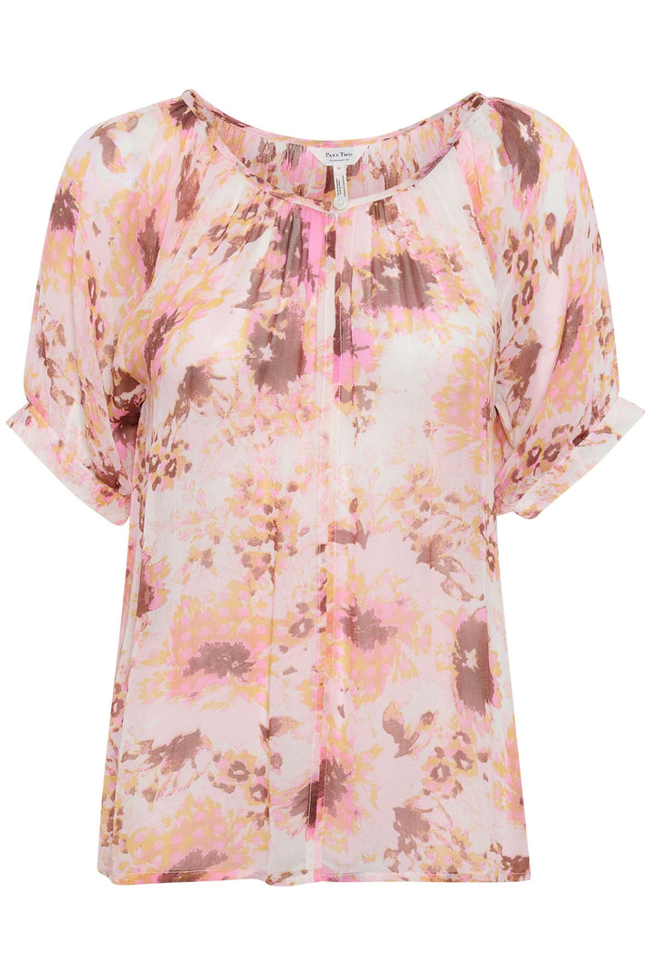 Blouse Rosanne légère à imprime floral rose, chic et décontractée, idéale pour l'été.