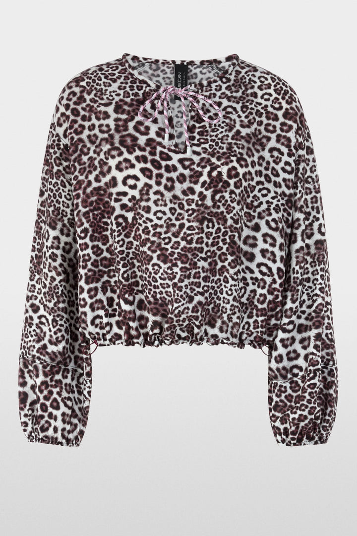 Blouse avec imprimé léopard, ample avec encolure en V et cordon de serrage, élastiques à l'ourlet, vêtement élégant et sportif.