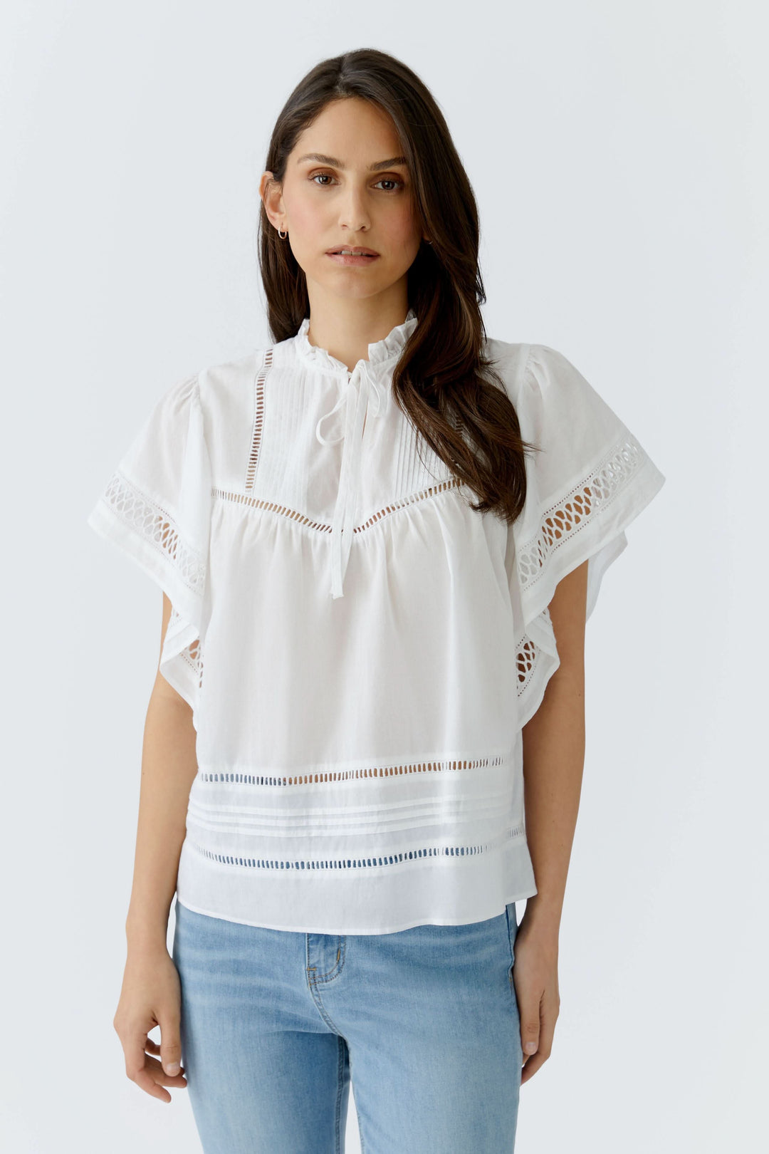 Blouse fluide à détails ajourés