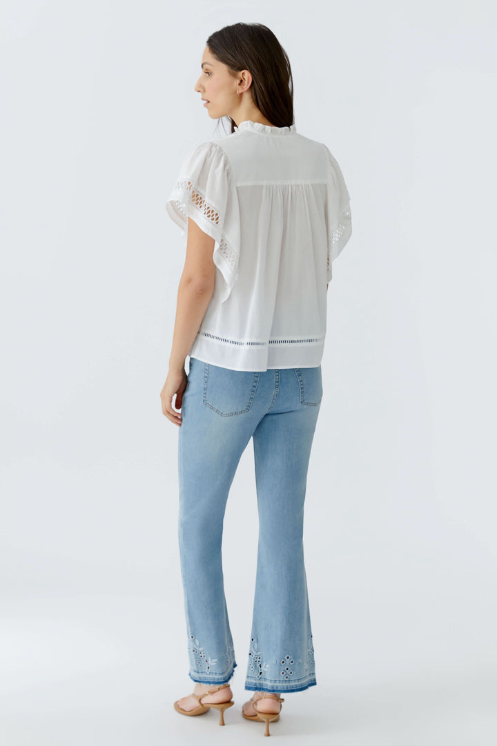 Blouse fluide à détails ajourés