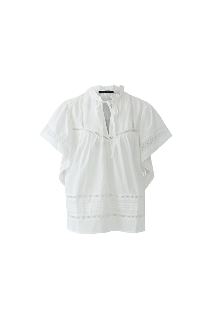 Blouse fluide à détails ajourés