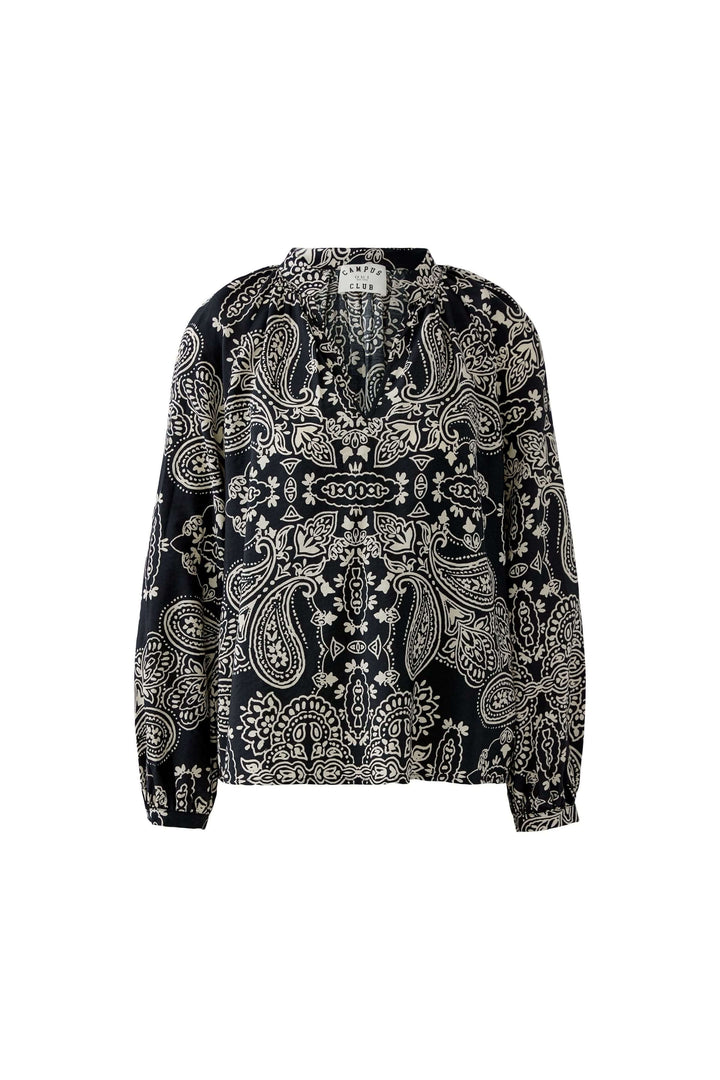 Blouse fluide imprimé graphique avec détails bohèmes