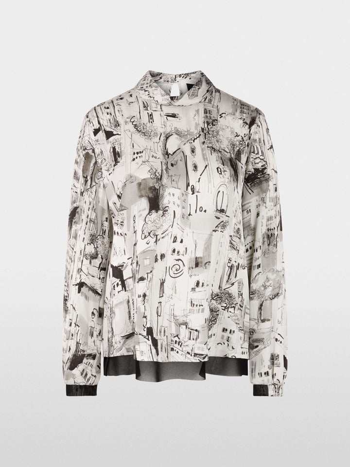 Blouse à imprimé CITY avec motif urbain graphique, col montant et manches longues, idéale pour une tenue élégante et dynamique.