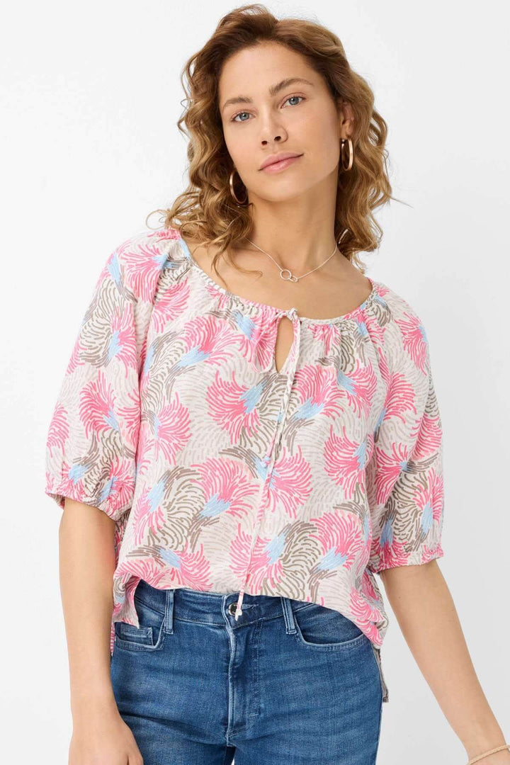 Blouse imprimée VIVA rose et bleu en lin, avec encolure à nouer et coupe ample, parfaite pour l'été.