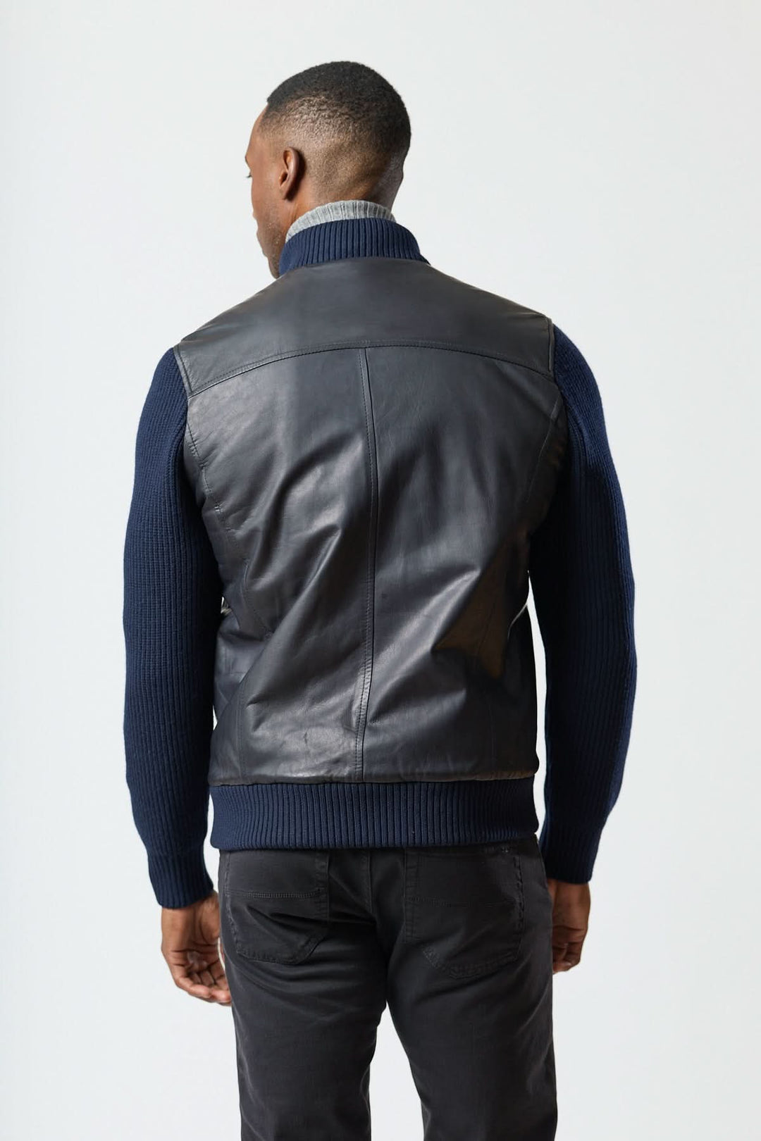 Hybrid leather and knit zip-up jacket