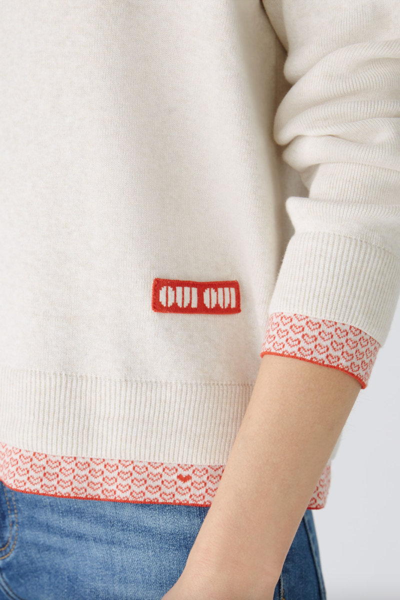 “Oui Oui” label sweater