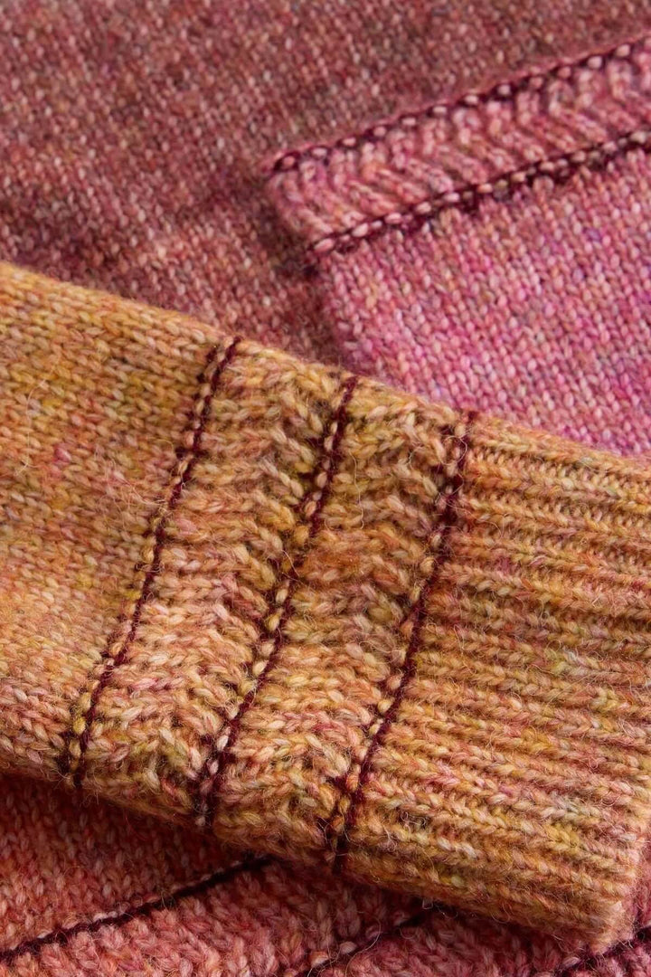 Chandail Lilbet en maille dégradée avec nuances chaudes et coutures distinctives, offrant confort et style.