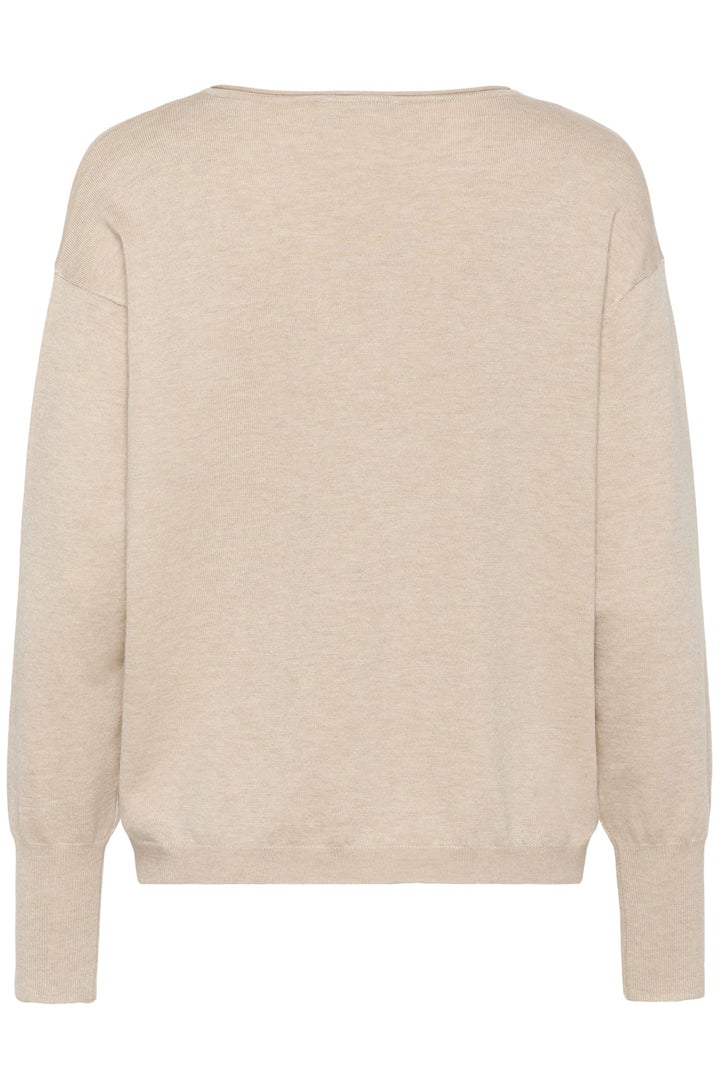 Chandail Lizza à encolure en V avec coupe ample et manches longues, offrant confort et style décontracté en maille douce.