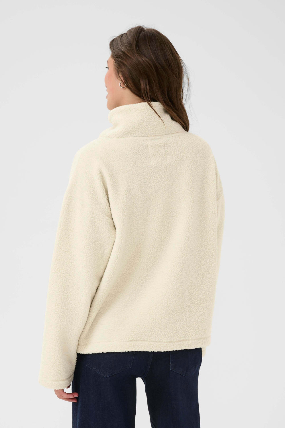 Chandail Sirana en tissu sherpa avec col montant zippé, coupe décontractée, pour un look cosy et urbain.