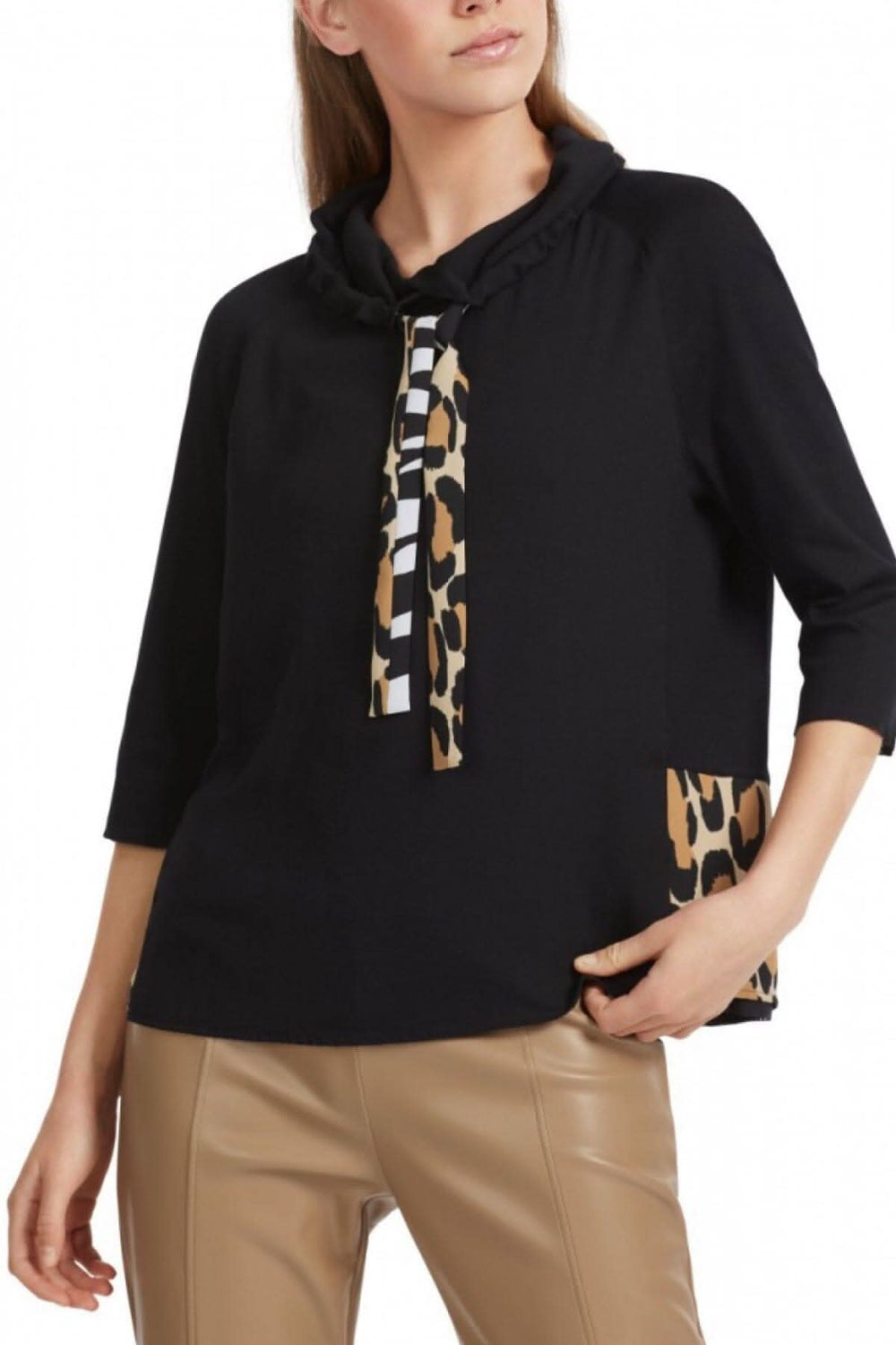 Chandail col montant noir avec motif animal et cordon de serrage, manches raglan, décontracté et ample.