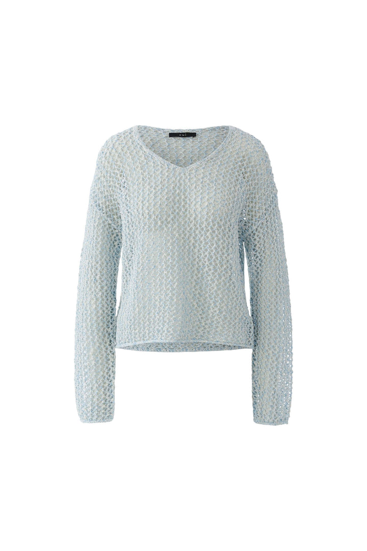 Chandail en maille ajourée à col en V léger et moderne, parfait pour superposition élégante et féminine. Décris moi le produit en français.