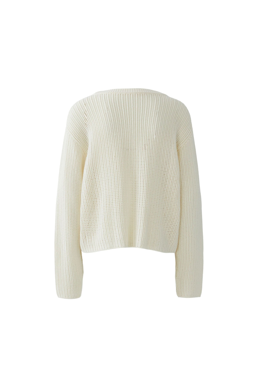 Chandail en maille texturée beige avec appliqués décoratifs brodés, coupe courte et encolure arrondie, moderne et confortable.