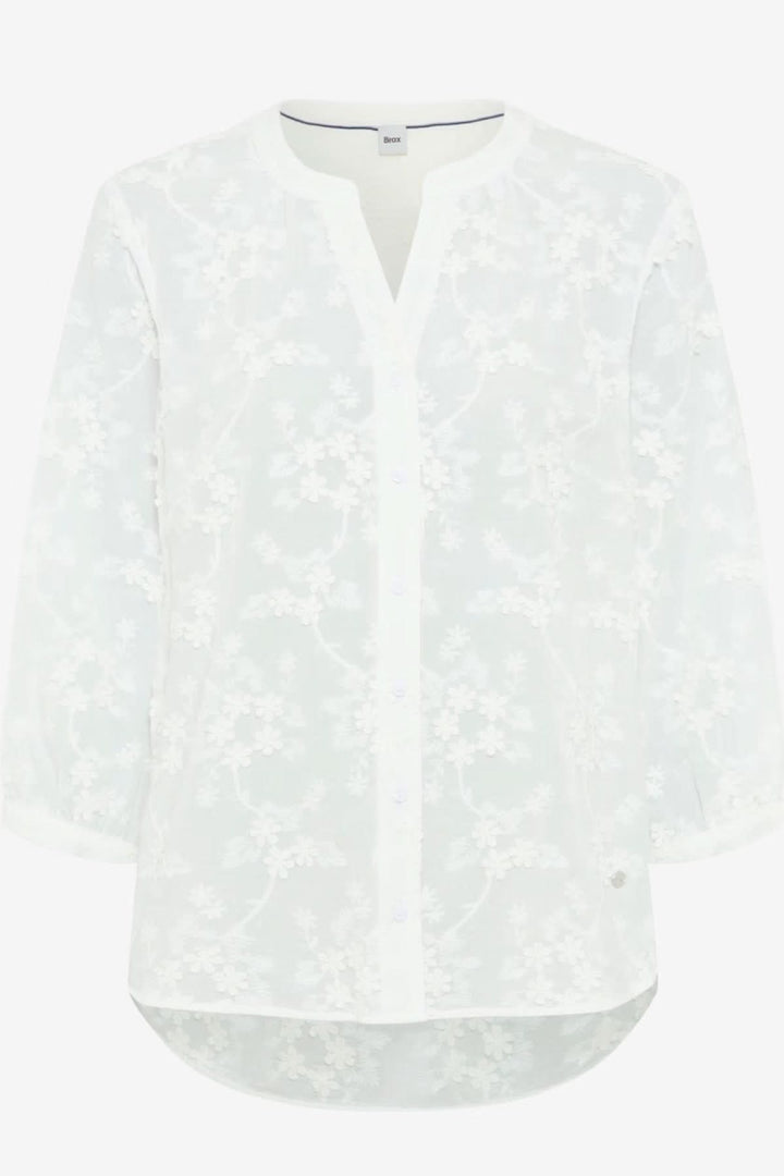 Chandail léger à broderie florale VELIA avec manches trois-quarts et encolure ouverte. Décris moi le produit en français.