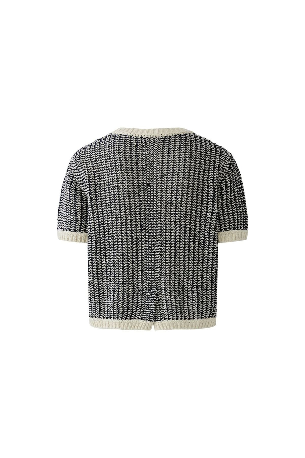 Chandail tricot motif texturé en noir et blanc, manches courtes, coupe ample pour tenue décontractée ou habillée.