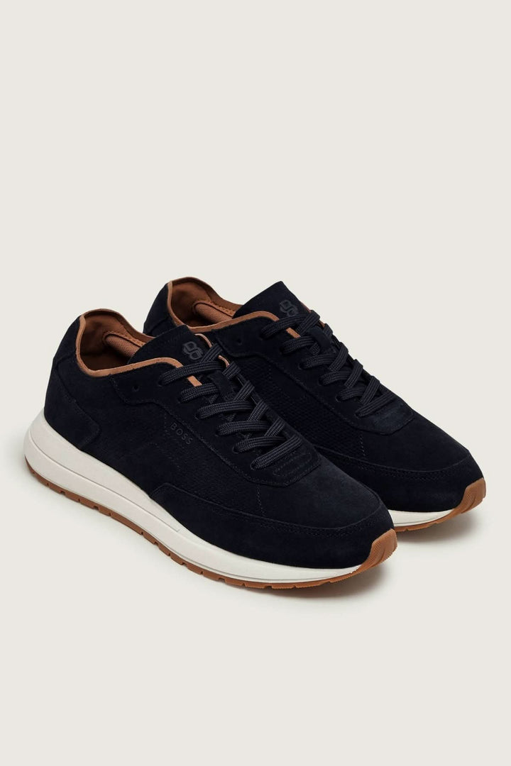 Chaussure de ville Vinston en suède perforé noir avec semelle contrastante, idéale pour un style casual ou habillé.