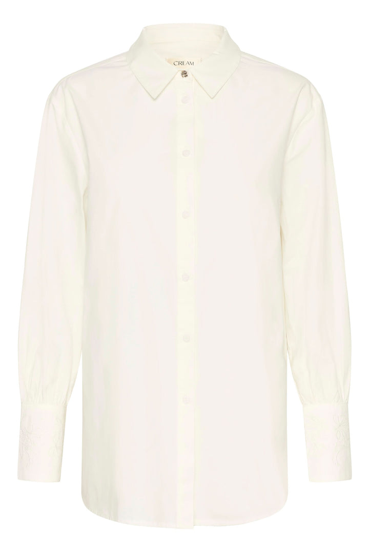 Chemise Alison blanche élégante à coupe fluide avec col classique et patte de boutonnage discrète, idéale pour bureau ou look décontracté.