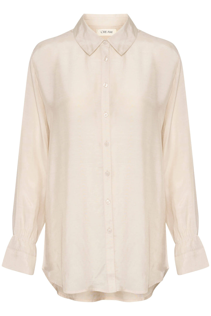 Chemise Arina à manches longues, coupe décontractée, couleur crème, boutons sur le devant.