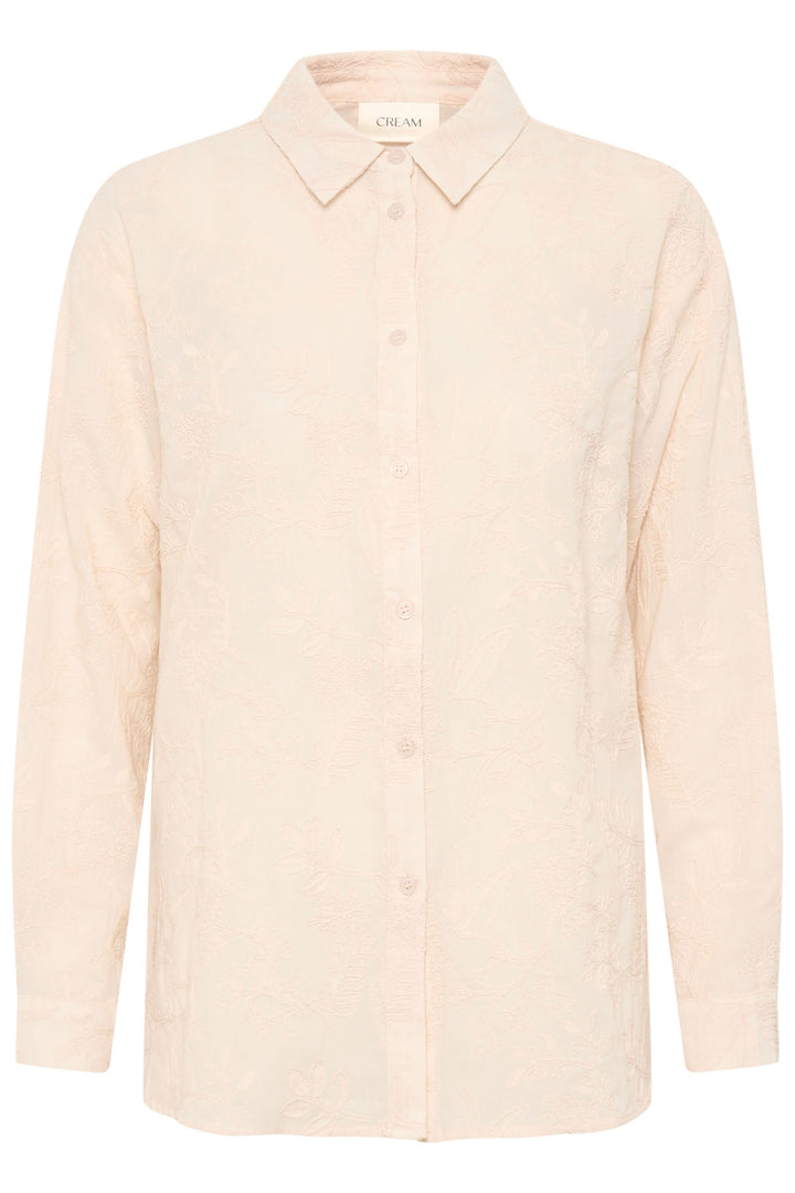 Chemise Luna élégante à broderies florales, coupe fluide, col classique, manches longues.