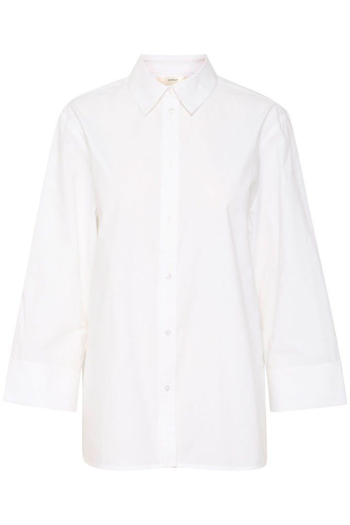 Chemise Merlissa oversize blanche en coton léger, au col classique et manches longues, chic et minimaliste.