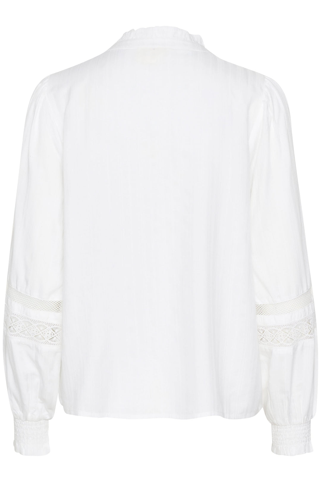 Chemise Paula, dos en blanc, avec manches bouffantes et empiècements en dentelle élégants, coupe fluide.