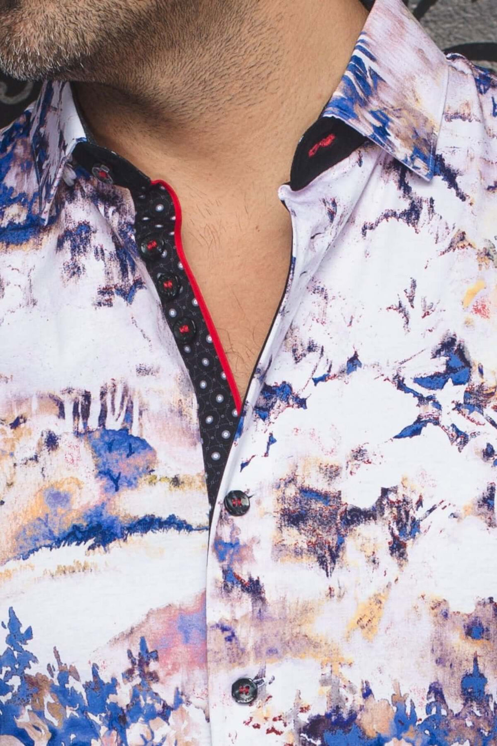 Chemise Zionne à manches courtes avec imprimé artistique floral et col contrastant.