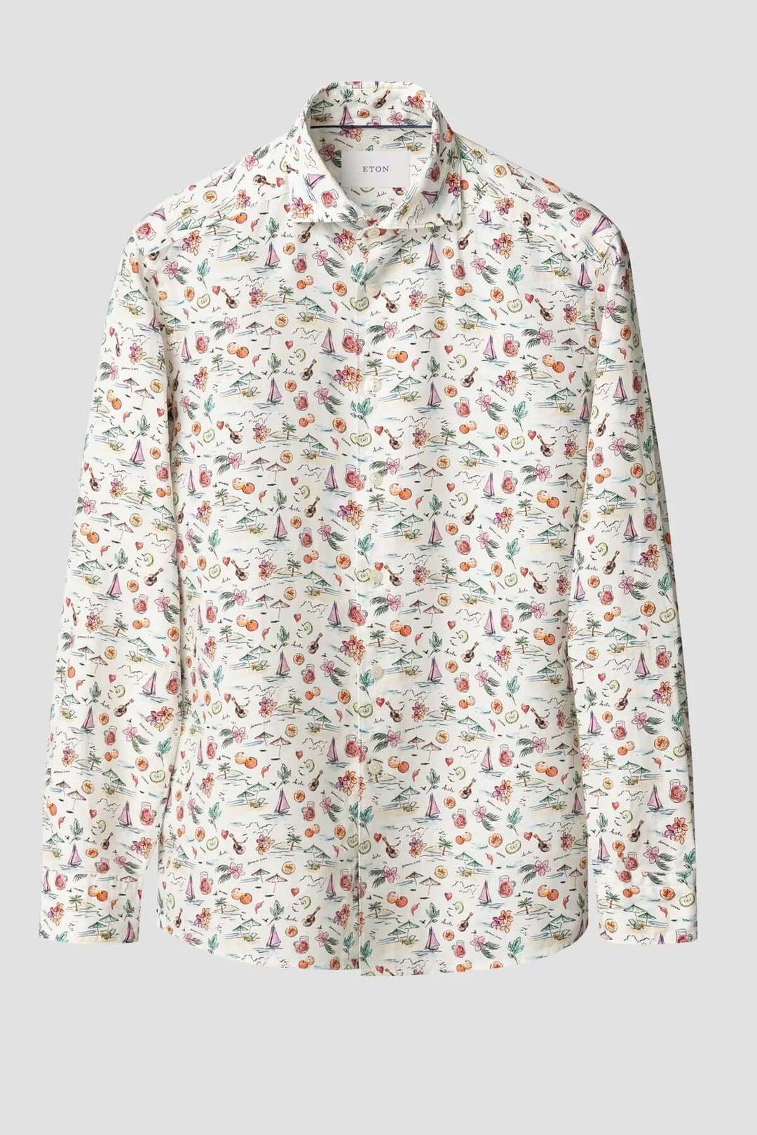 Chemise en lin légère avec imprimé estival coloré de fruits et parasols, parfaite pour une tenue d'été élégante.