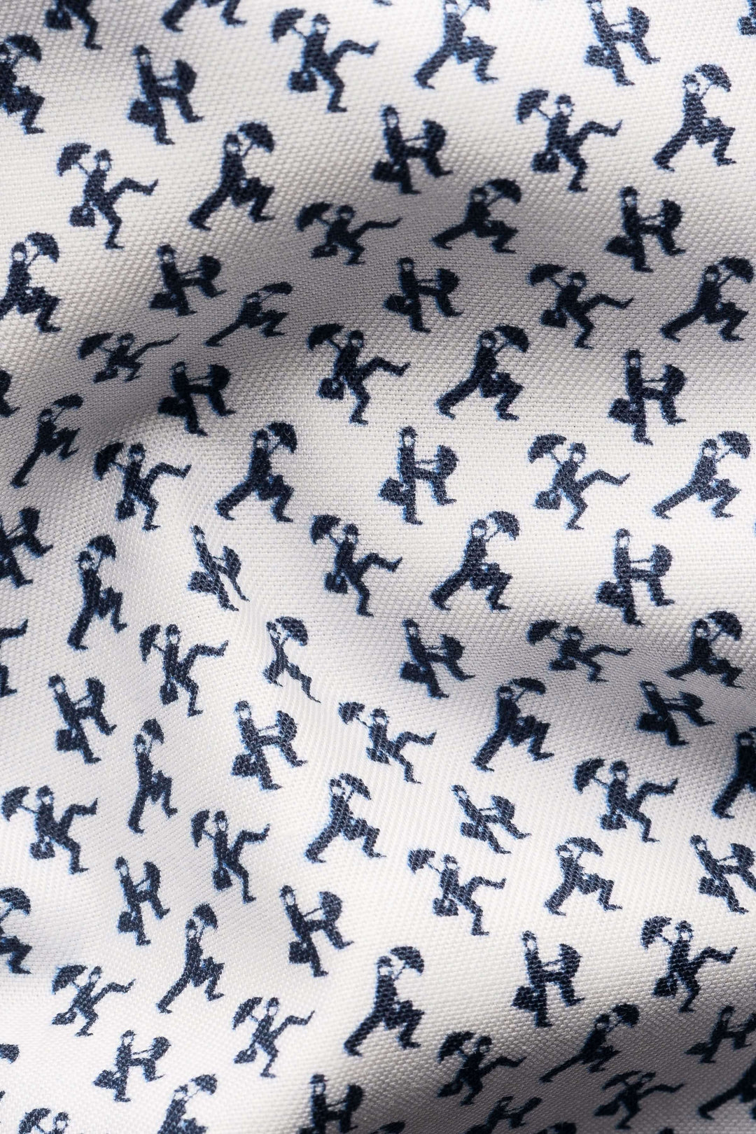 Imprimé original de silhouettes en mouvement sur tissu pour chemise habillée élégante.