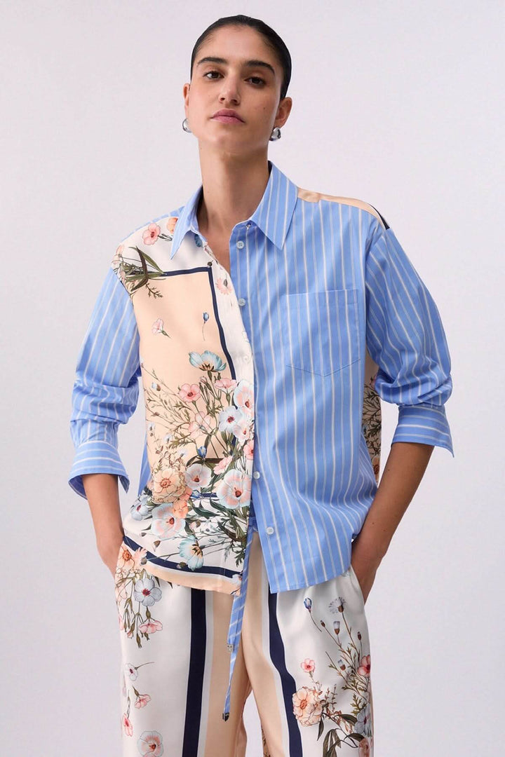 Chemise à manches longues avec motifs contrastés portée par mannequin.