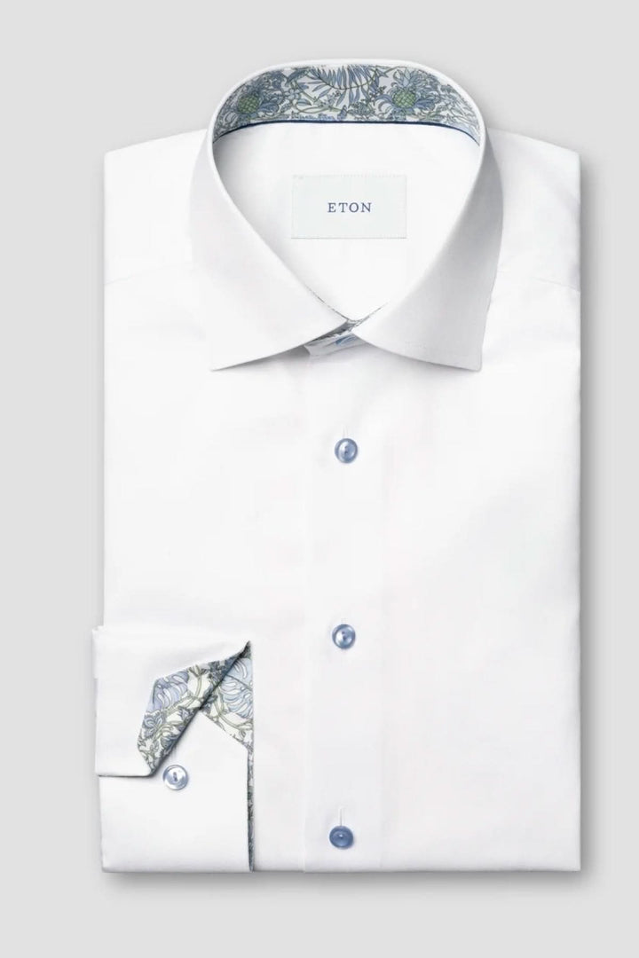 Chemise à manches longues en sergé signature avec motif discret et col classique structuré, idéale pour le travail ou les occasions habillées.