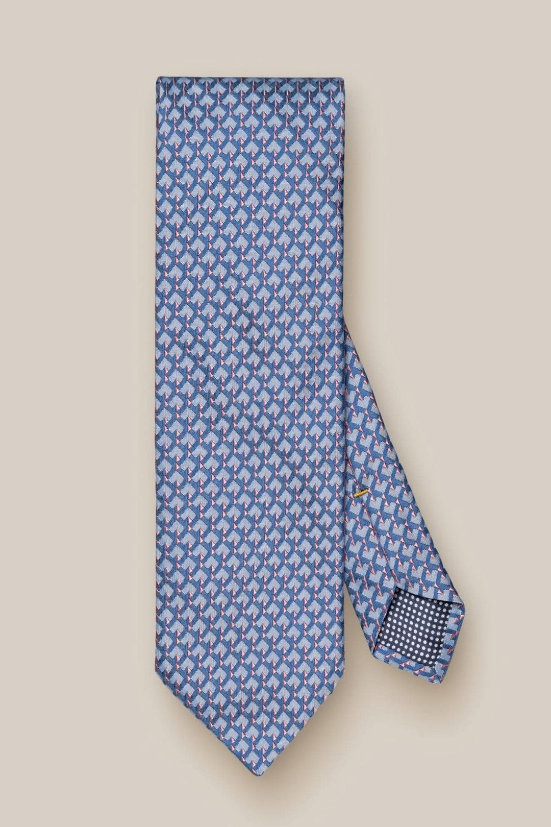 Cravate en soie à motif géométrique bleu, gris et rose, tissage texturé, élégance moderne.