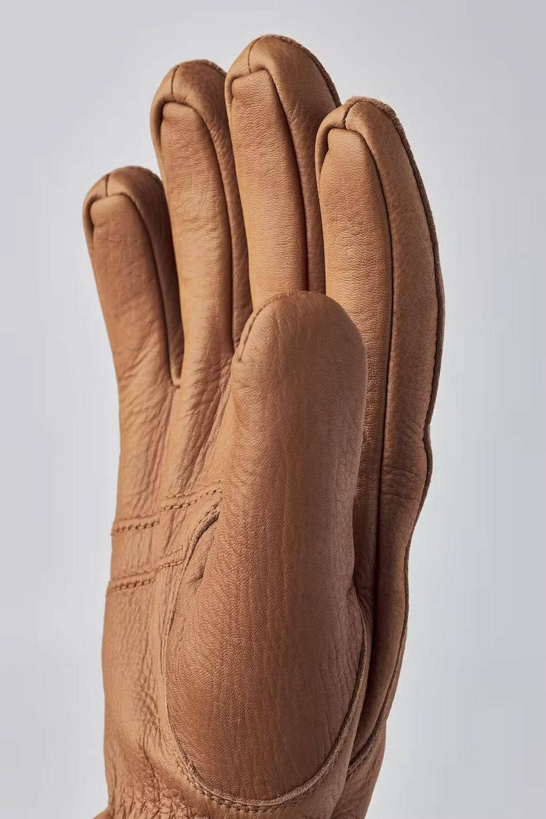 Gant de cuir Tore en peau de cerf, geste de la main, confort et style pour l&