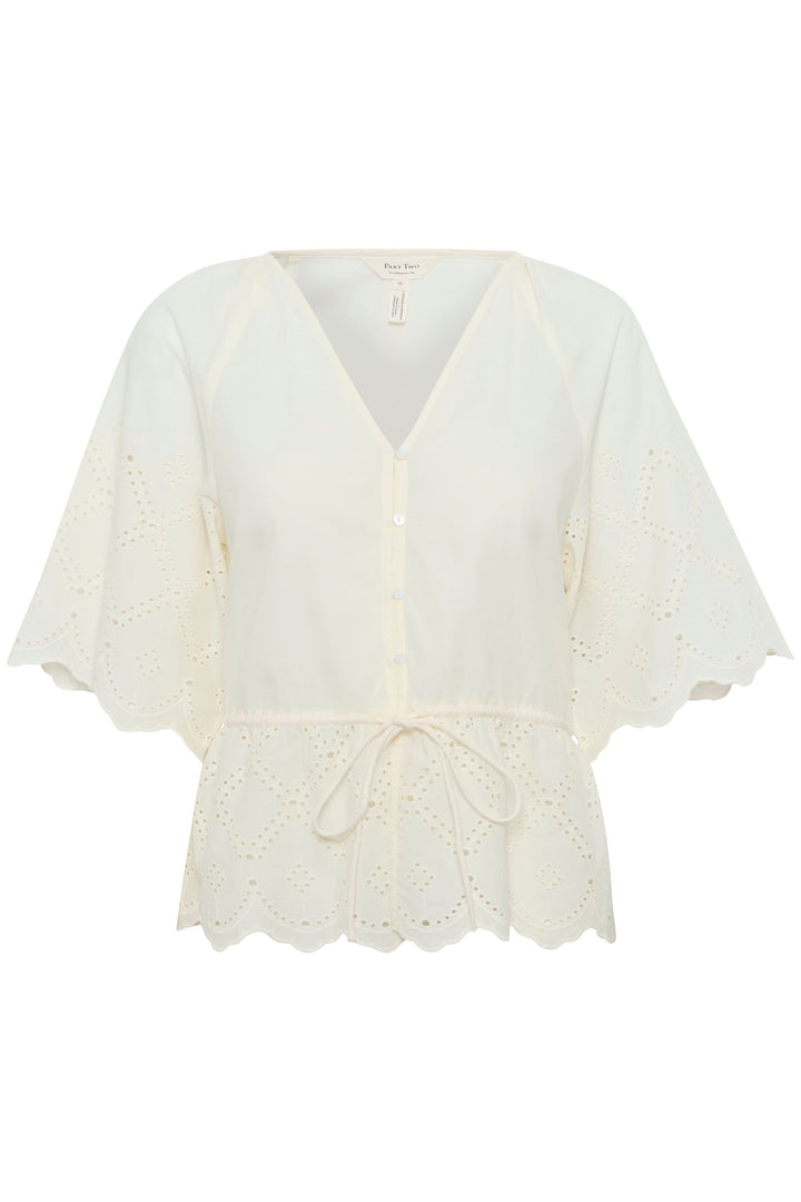 Blouse romantique en coton léger avec broderie anglaise et encolure en V, parfaite pour les journées ensoleillées.