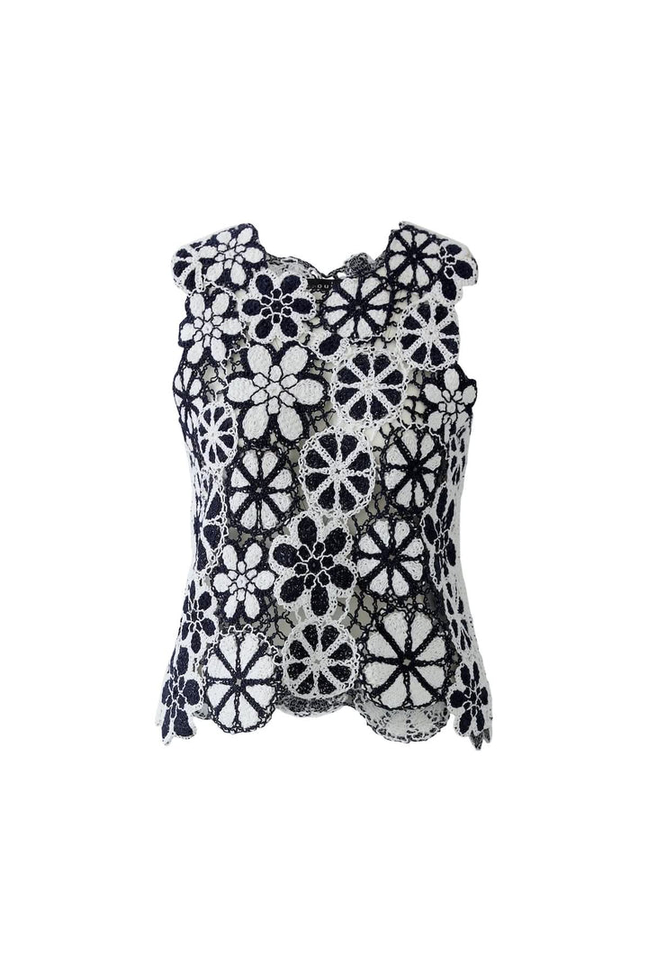 Haut coupe moderne minimaliste avec motifs floraux en dentelle, parfait pour une garde-robe élégante et polyvalente.