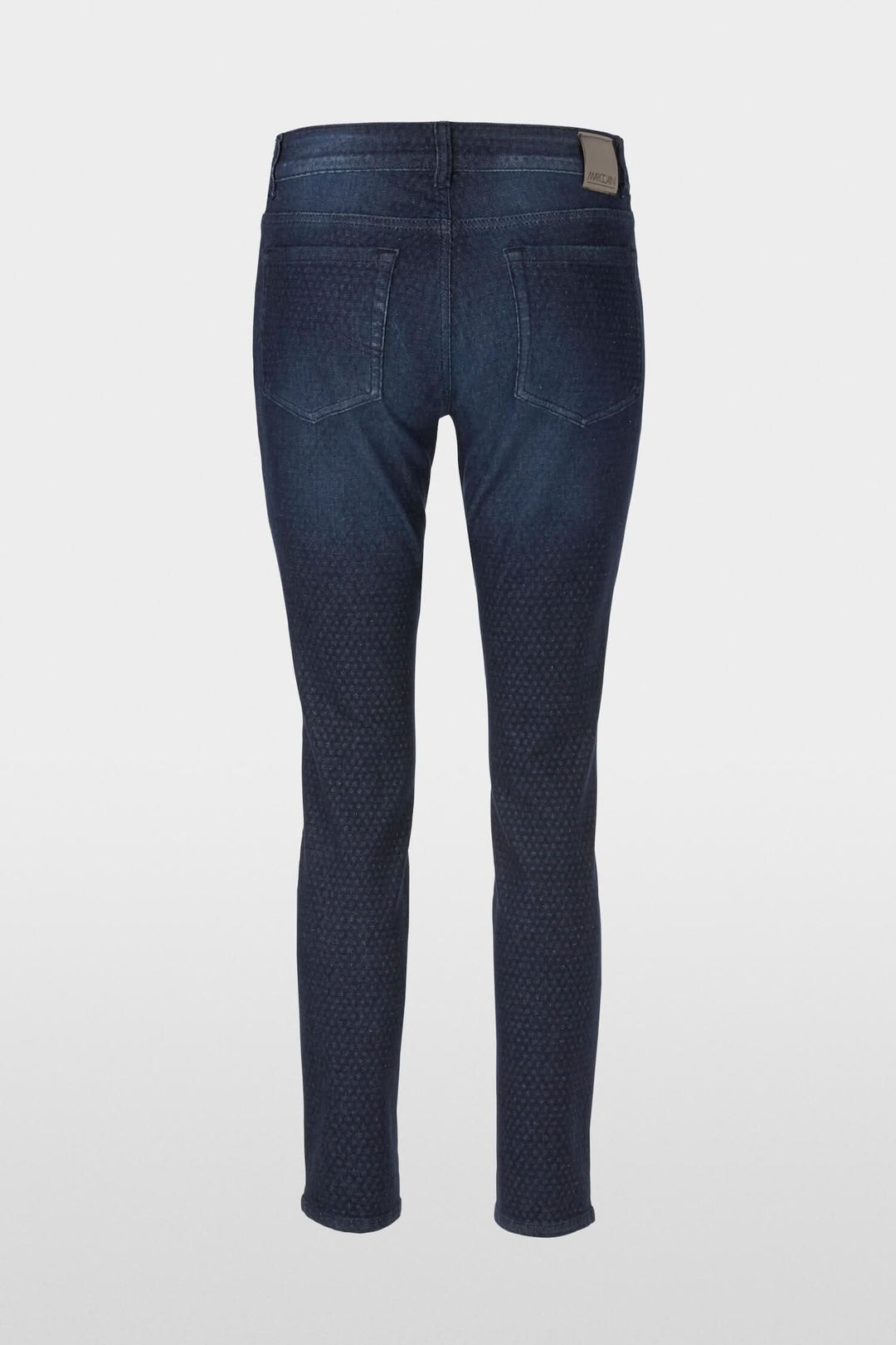 Jean Silvi slim fit à taille basse, coupe fuselée, avec motif quadrillé sur fond foncé.