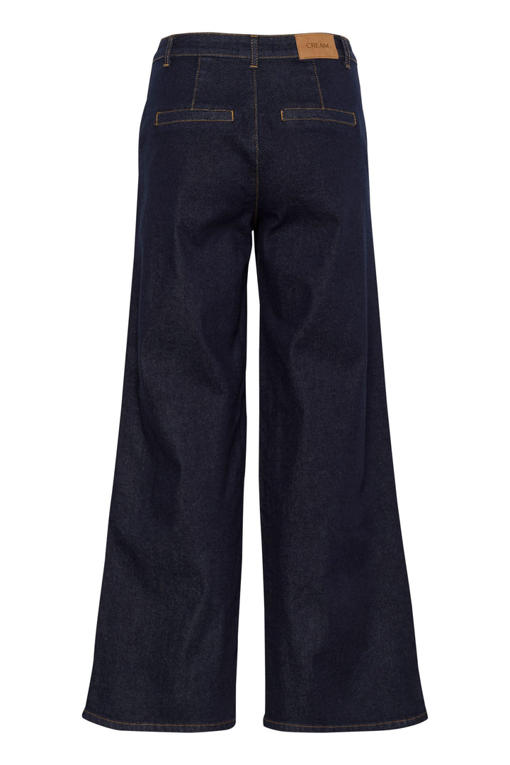Jean Visti à jambe large, coupe fluide, taille mi-haute, de couleur bleu foncé, vue arrière.