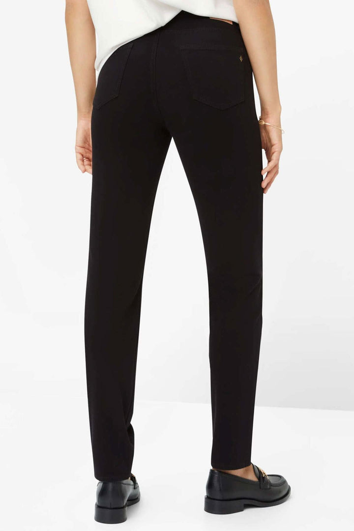 Jeans skinny noir vue arrière, style moderne avec poches élaborées et surpiqûres décoratives.