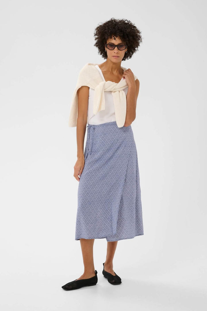 Jupe Arielle, jupe midi fluide avec imprimé délicat et taille ajustable, idéale pour tenues estivales et looks soignés.