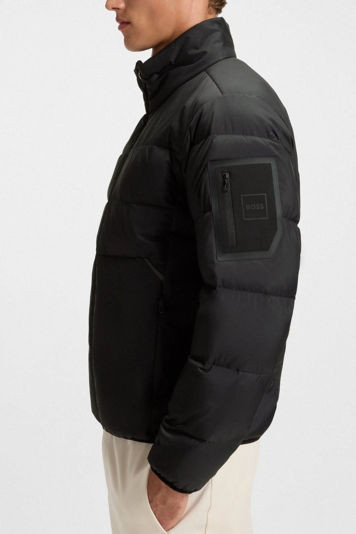 Water-repellent quilted down coat with sleeve pocket