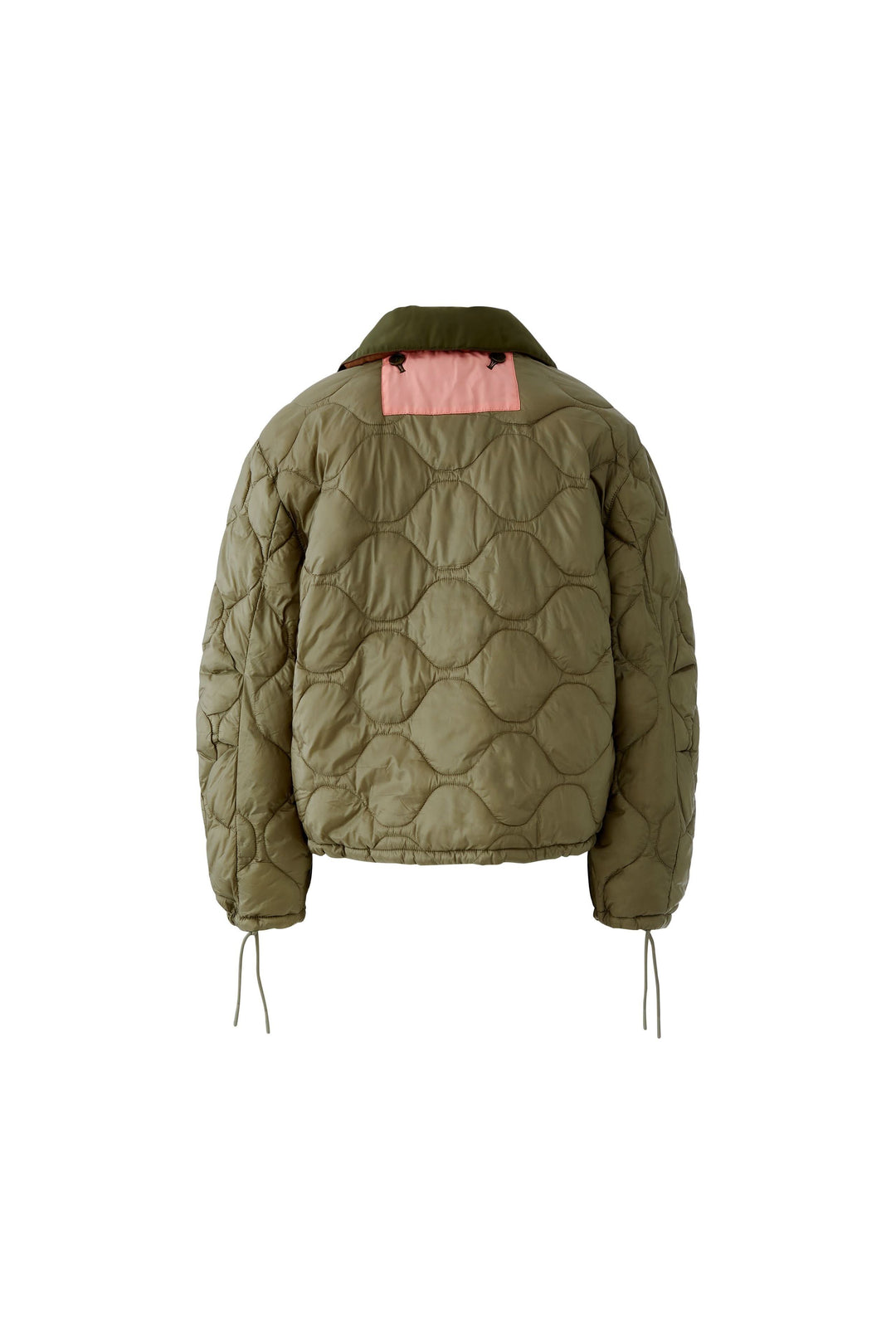 Manteau réversible matelassé avec design matelassé vert et col contrasté rose, idéal pour deux styles différents.