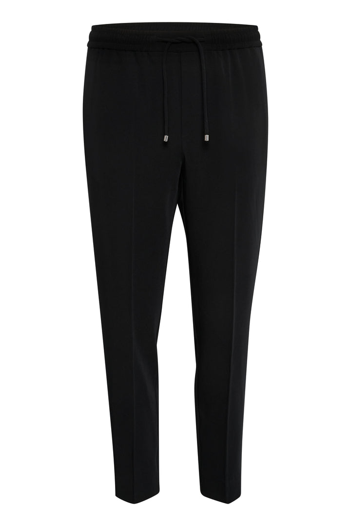 Pantalon Adian noir inspiré du jogger, avec taille élastique, poches et coupe décontractée.
