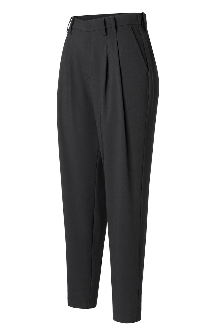 Pantalon Chelsea chic et sophistiqué avec taille élastique, plis français, et coupe moderne pour bureau ou sortie élégante.