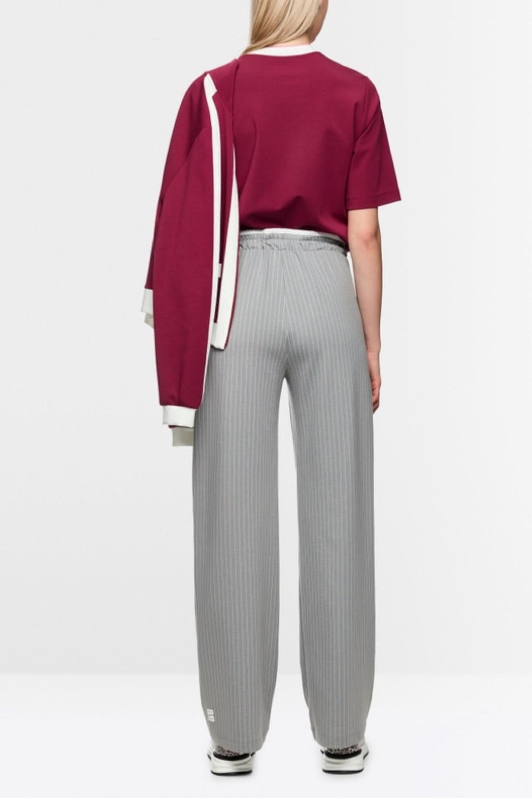 Pantalon Washington à rayures avec coupe ample, taille élastiquée et poches latérales pour un look sportif et élégant.
